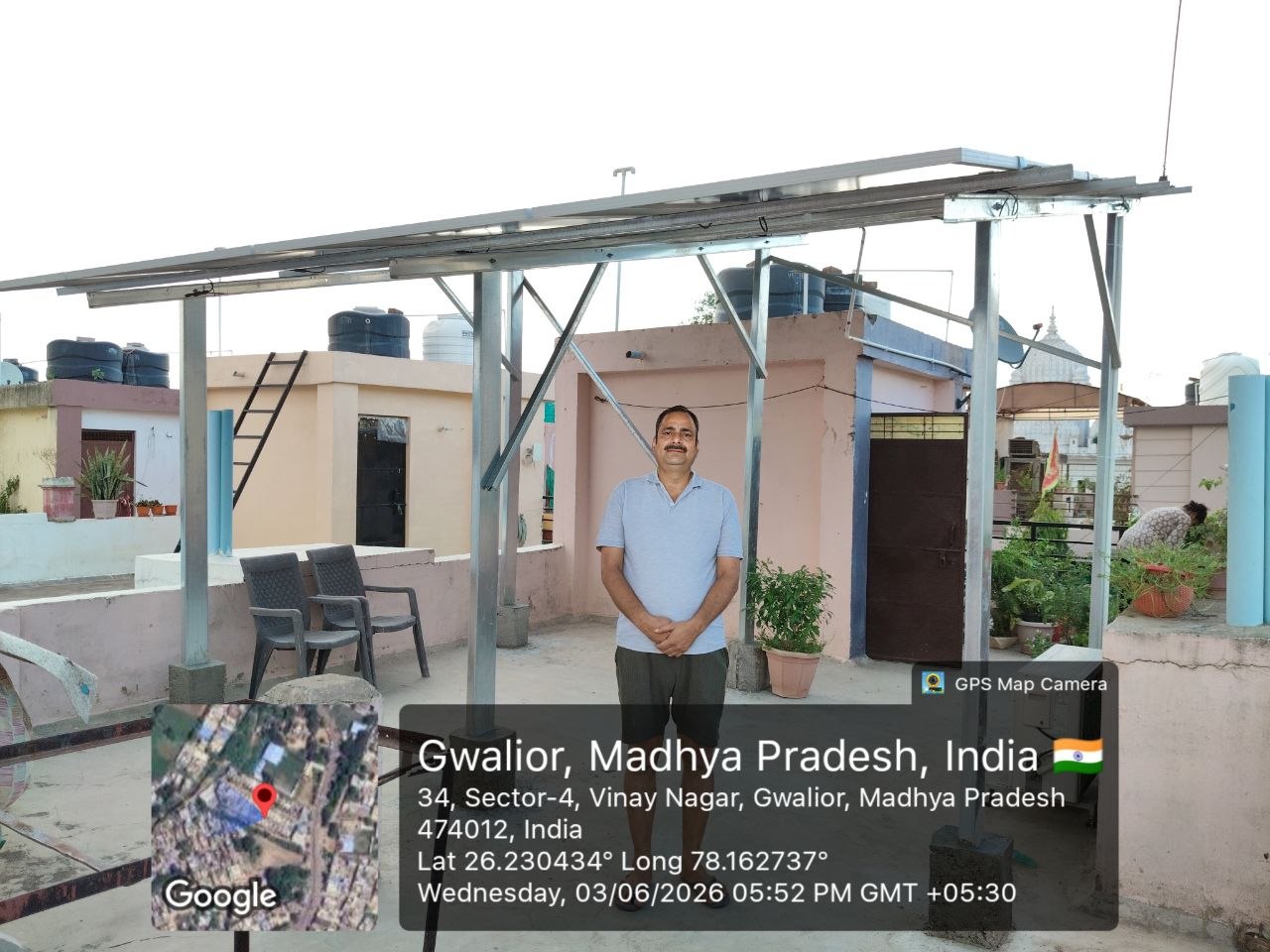 Completed solar structure with customer at Gwalior rooftop